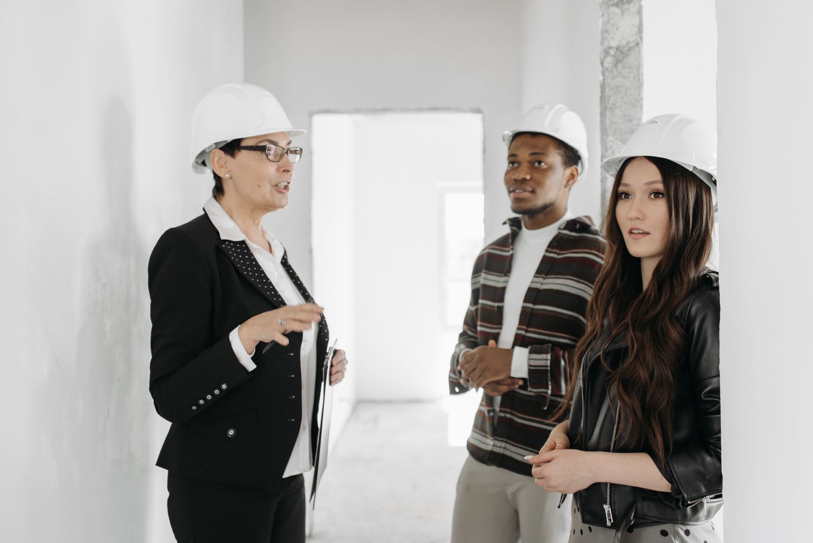 A property manager checking a home's keys and condition